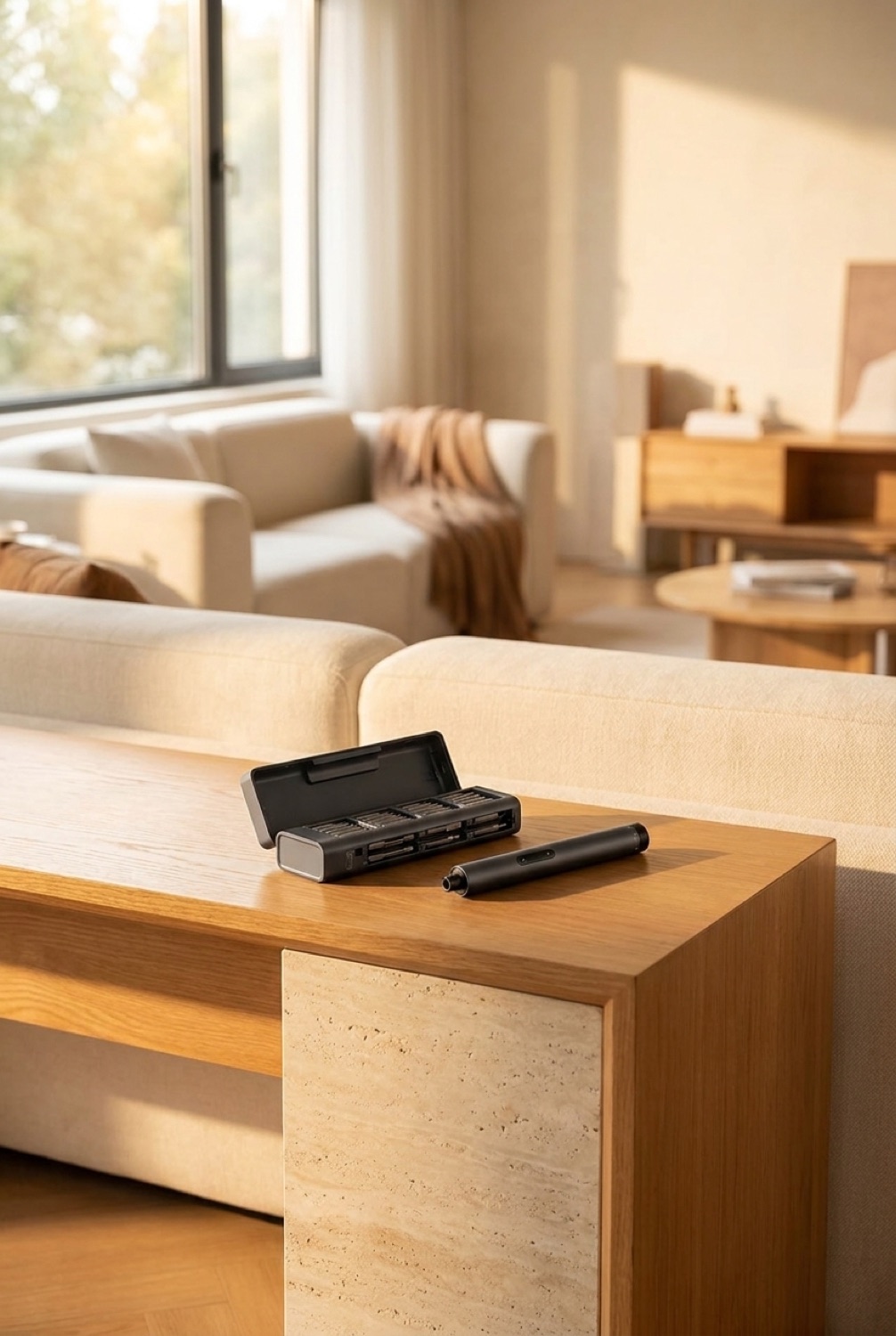 electric screwdriver on a clean modern console in soft golden-hour light