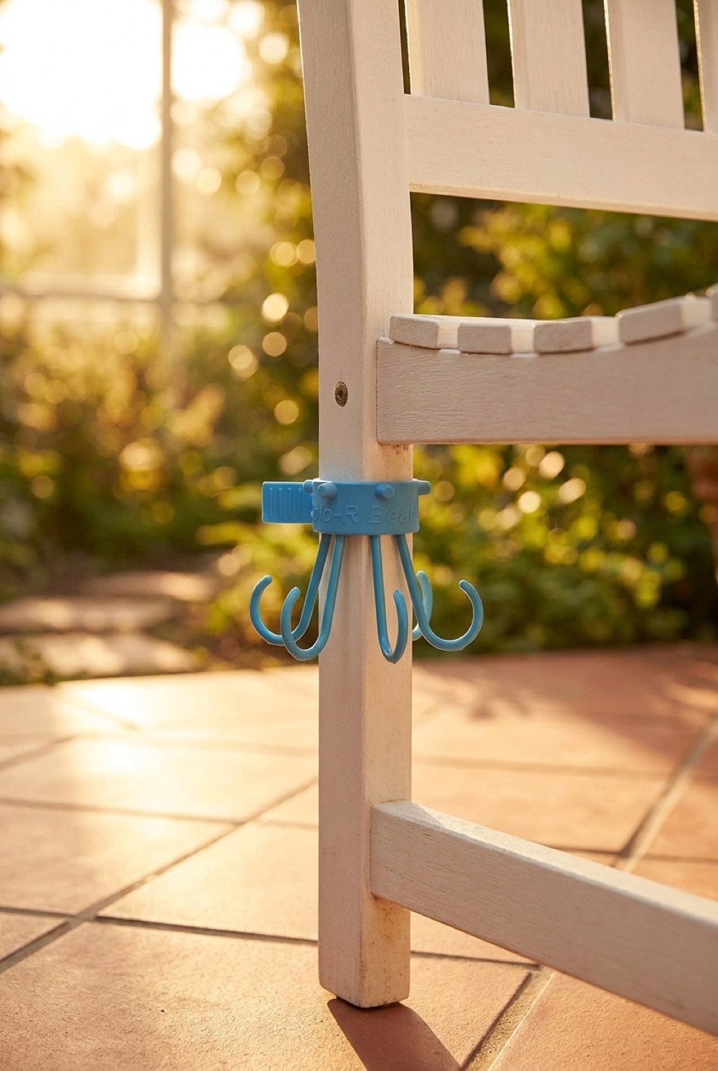 Outdoor Chair Bag Hook in a sunny calm garden in soft golden-hour light