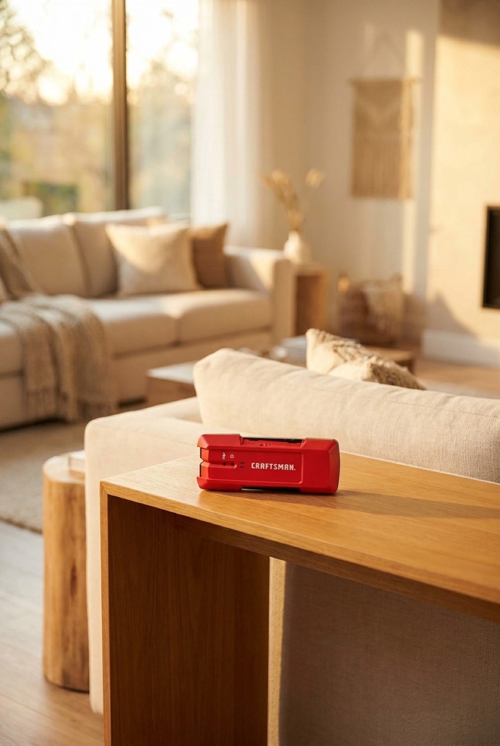 stud finder on a clean modern console in soft golden-hour light